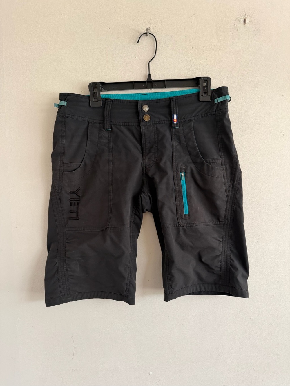 Yeti Men's Black Shorts with Teal Trim